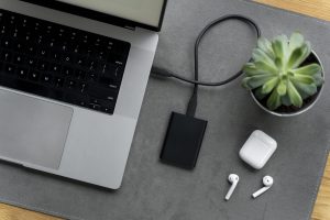 Desk arrangement with ssd and laptop top view